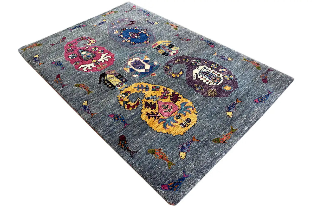 Gabbeh Lori rug, angled, blue-gray with colorful animal motifs and medallions