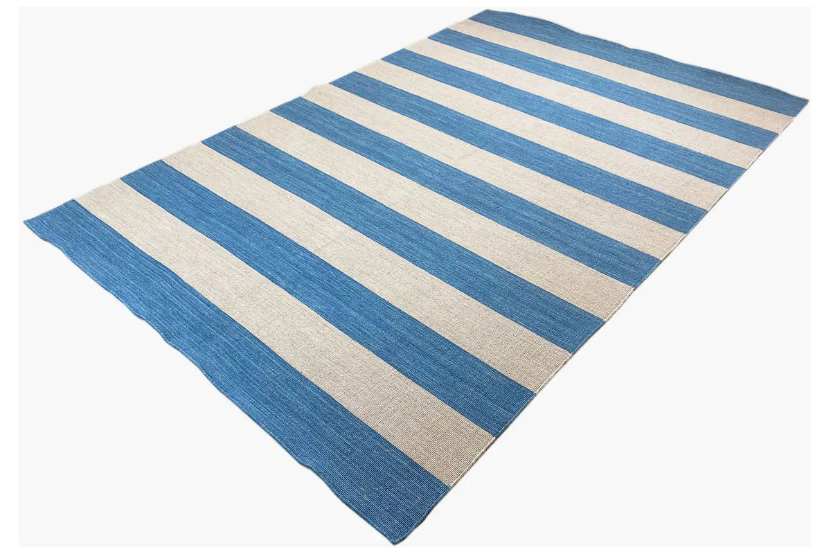 Kilim rug, diagonal view, wide blue-beige stripes