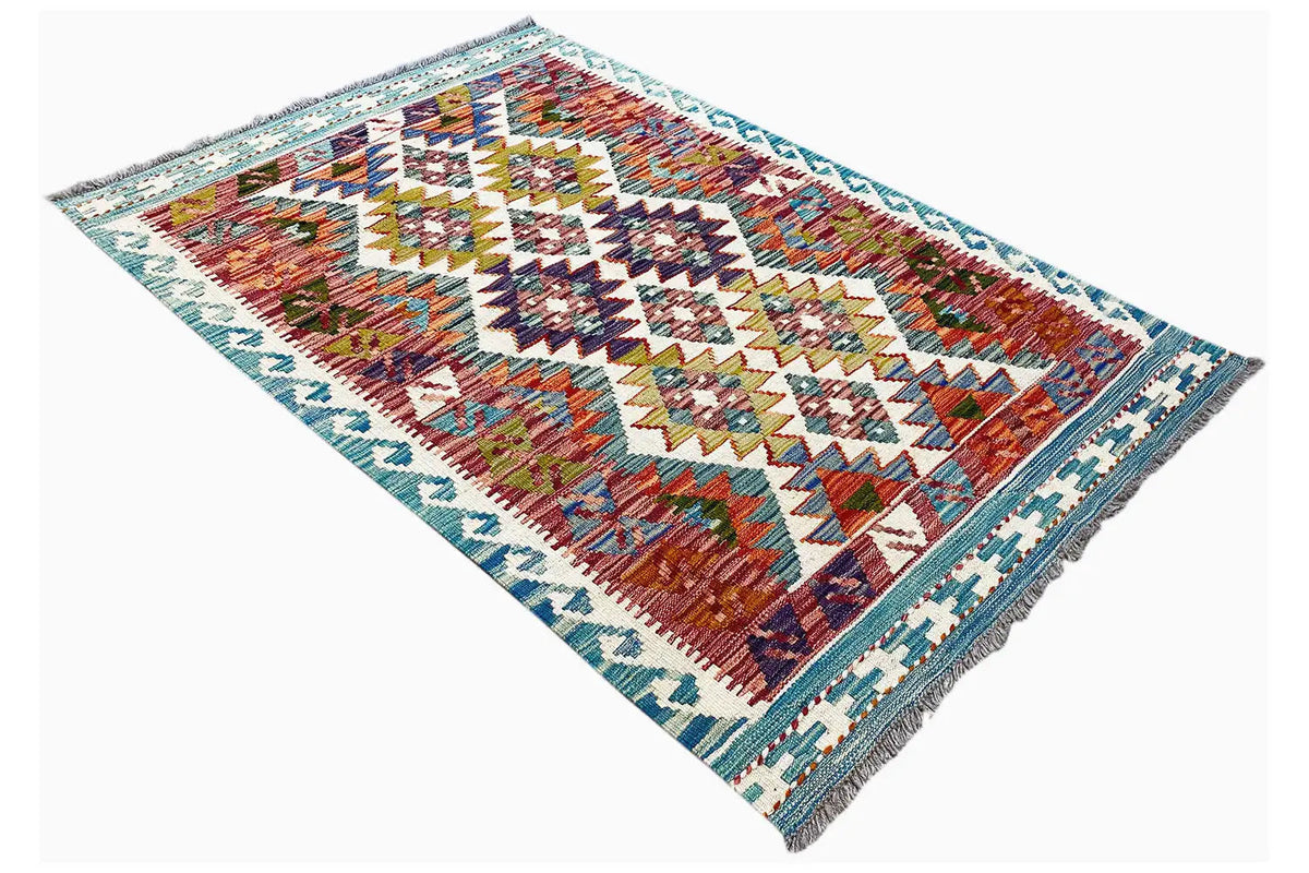 Afghan kilim 142x98 cm, viewed diagonally from above, lively pattern in orange, blue, and red