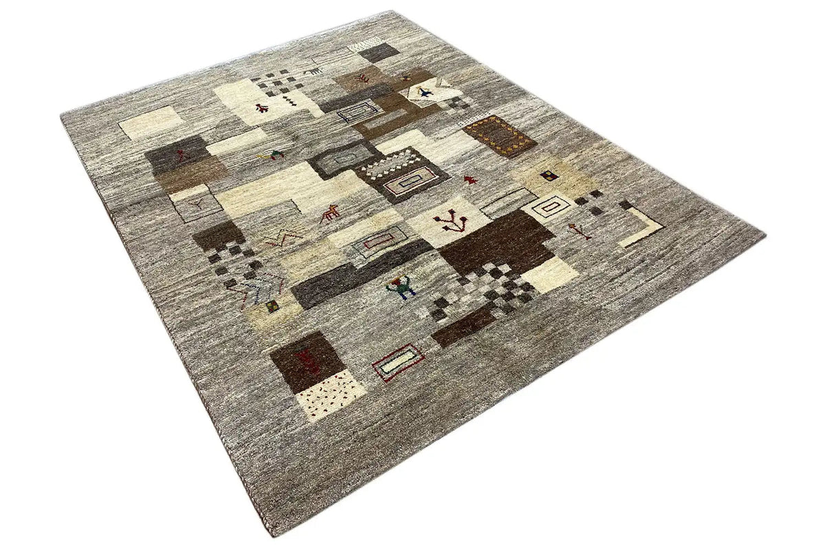 Gabbeh rug with a patchwork pattern in gray and beige made up of various rectangles