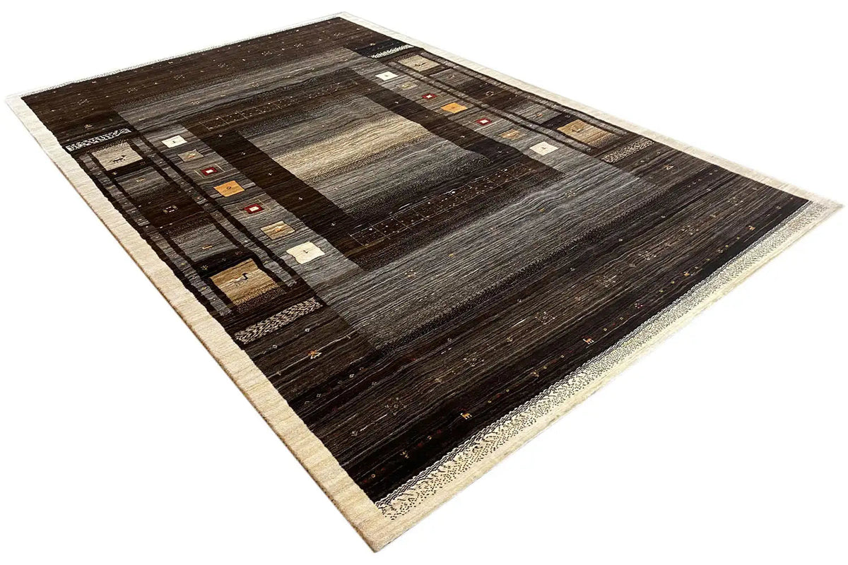 Gabbeh Lori rug, diagonal view with a brown center and woven stripes