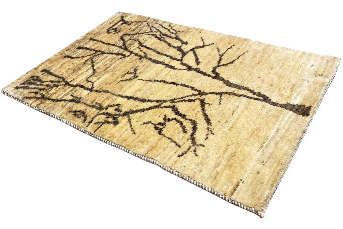 Gabbeh-Lori rug with a beige background and dark branch pattern, flat edge