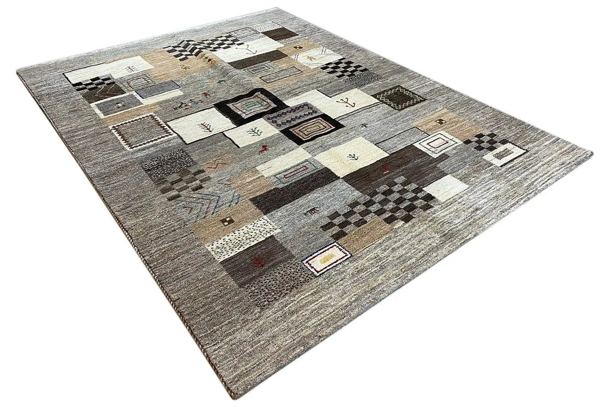 Gabbeh rug, rectangular, light gray with a dense patchwork of squares and stripes