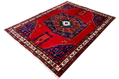 Rug with a red and blue pattern and border, laid out squarely