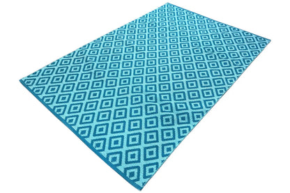 Blue kilim with a square pattern alternating between light blue and dark blue