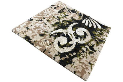Square rug 60x60 cm with a beige background and black decoration with green spots