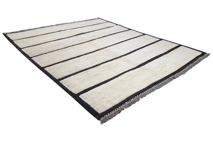 Gabbeh rug with beige fields and dark lines, laid out in a rectangular arrangement, 190x155 cm