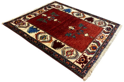 Poshti Qashqai rug 94x80 cm at an angle, red field with an ornamental cross motif