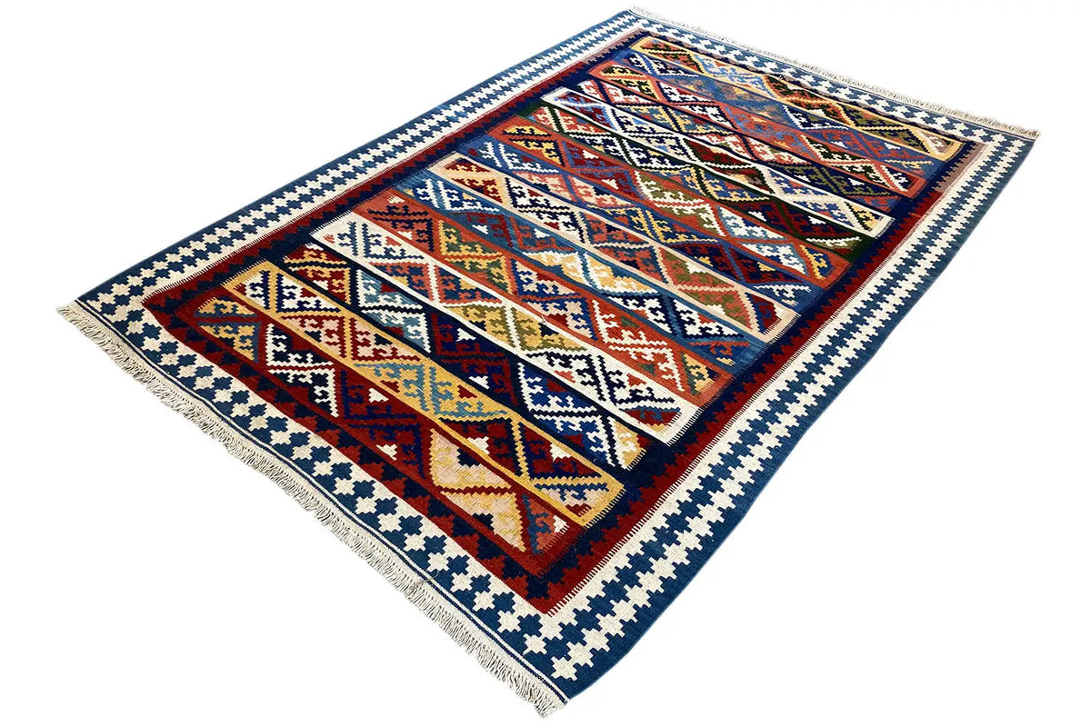 Square kilim rug, diagonal view: multicolored border pattern with fringe.