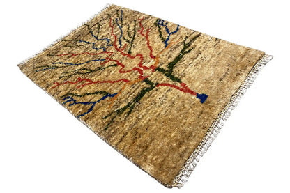 Beige rug with an ornamental pattern in red, blue, and green, and fringes on the sides