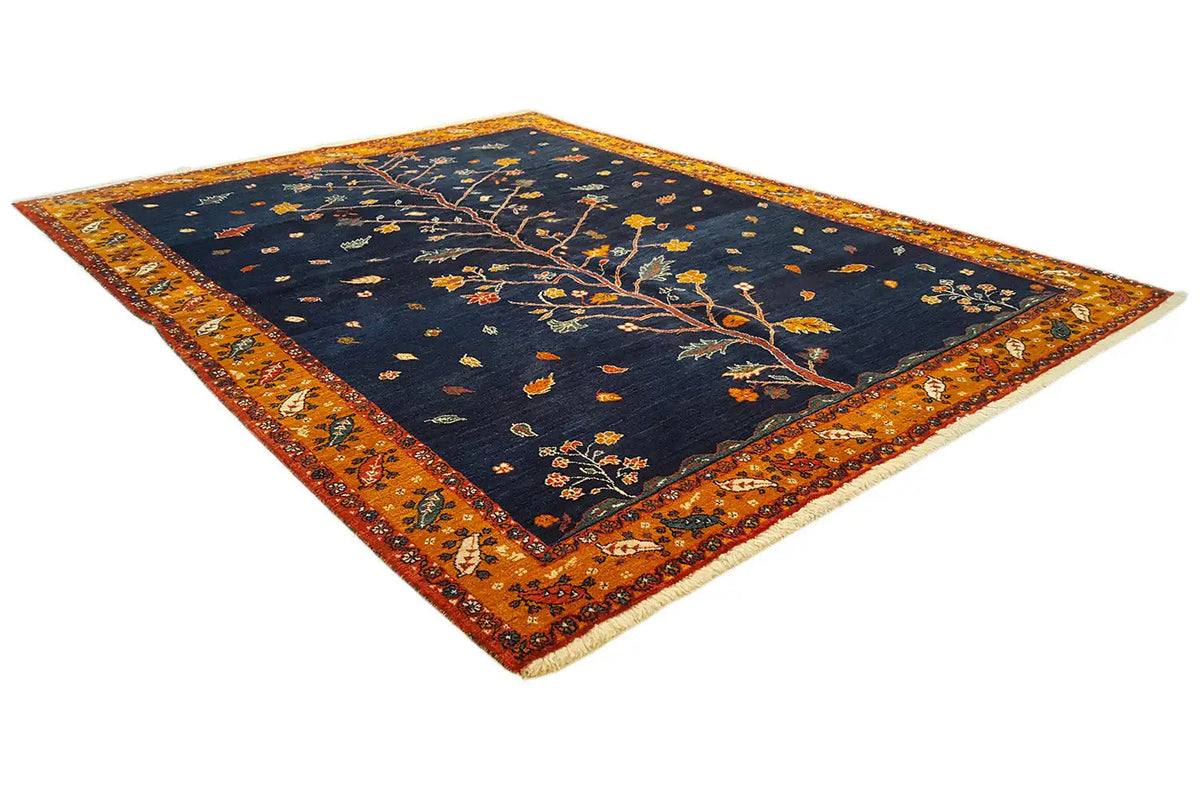 Oriental rug, diagonal: dark blue background with an orange-brown border