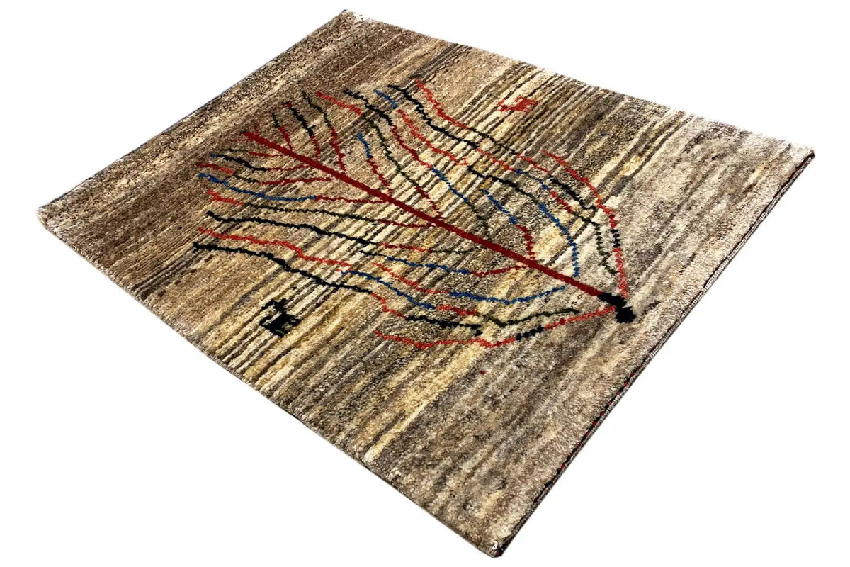 Gabbeh rug with a tree motif, beige texture, red and blue embroidered lines, fringes