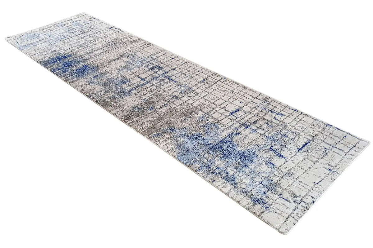 Long-format rug: light gray base pattern with a blue grid and accents