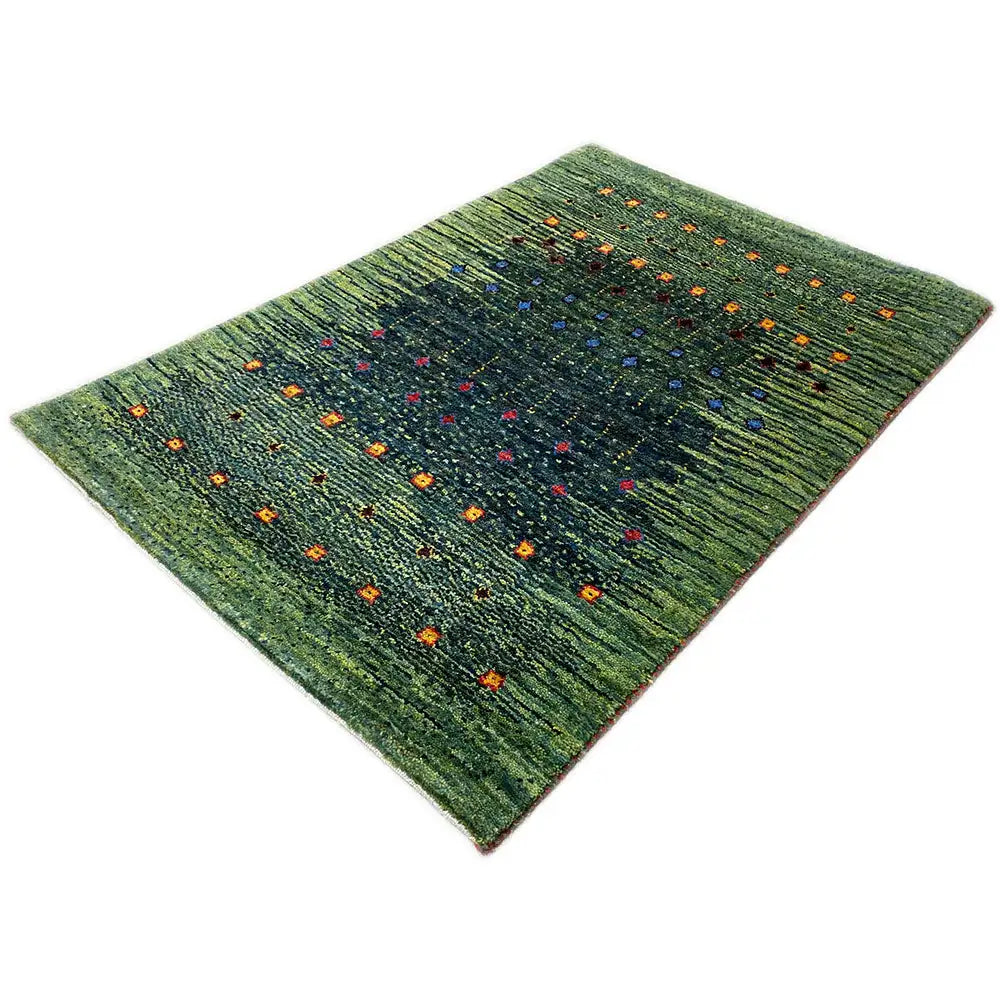 Gabbeh rug Lori, green with multicolored ornamental dots, photographed diagonally, 95x61 cm