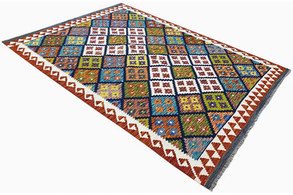 Afghan kilim spread diagonally with colorful patchwork of diamonds and crosses, wide border