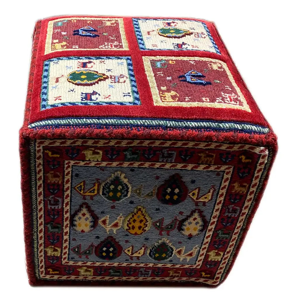 Soumak rug: red field with tile motifs and a multicolored side border.
