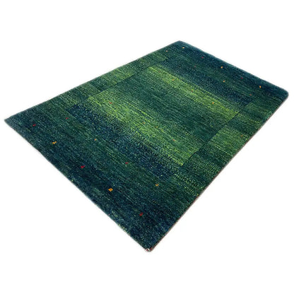 Gabbeh rug Lori, 98x64 cm: green-blue block pattern with small colorful accents