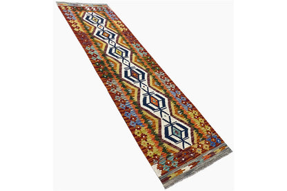 Afghan kilim runner with a central diamond motif and colorful decorative border