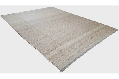 Kelim Qashqai rug, light beige, simple pattern, photographed at an angle, fringed edge
