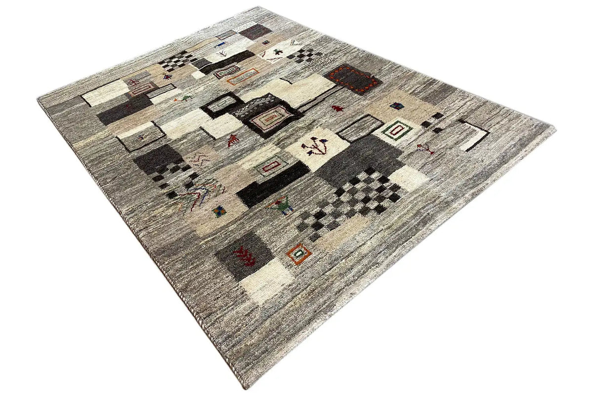 Gabbeh rug 198x146 cm, viewed from above with a high-contrast patchwork pattern