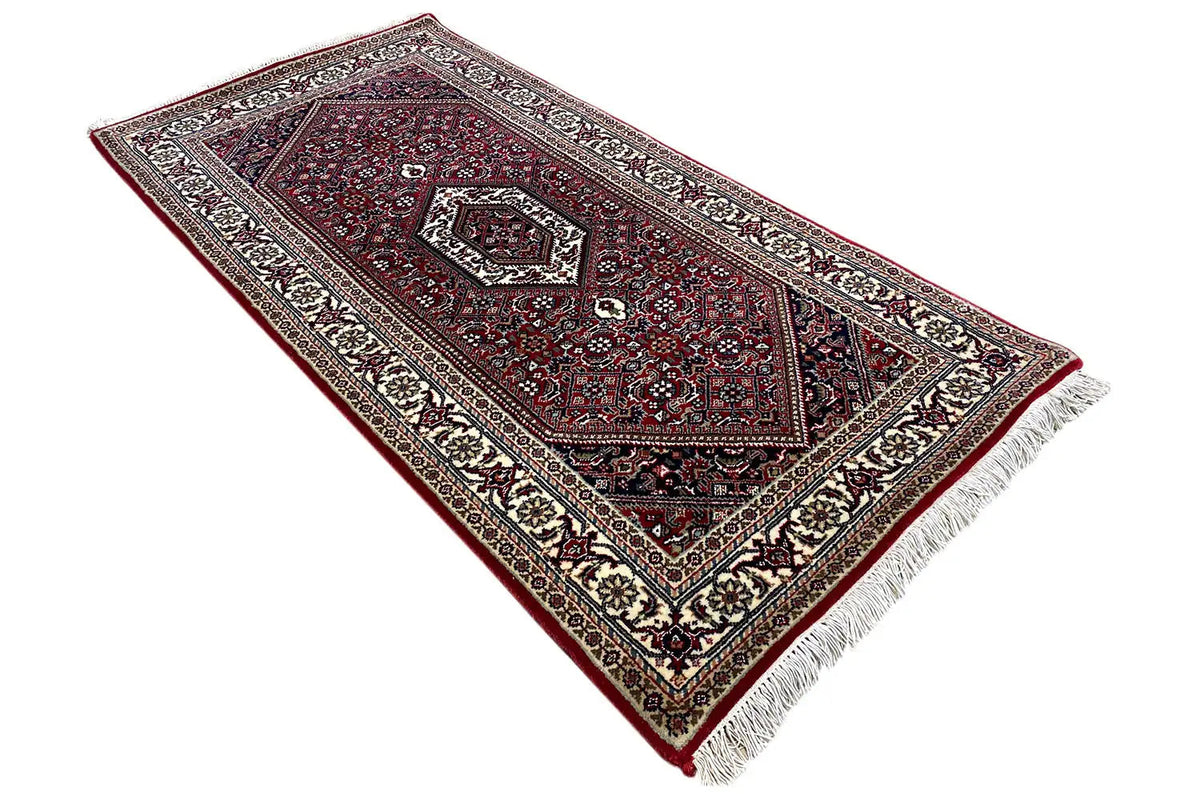 Bidjar rug, three-sided visible border, dark red and cream ornaments