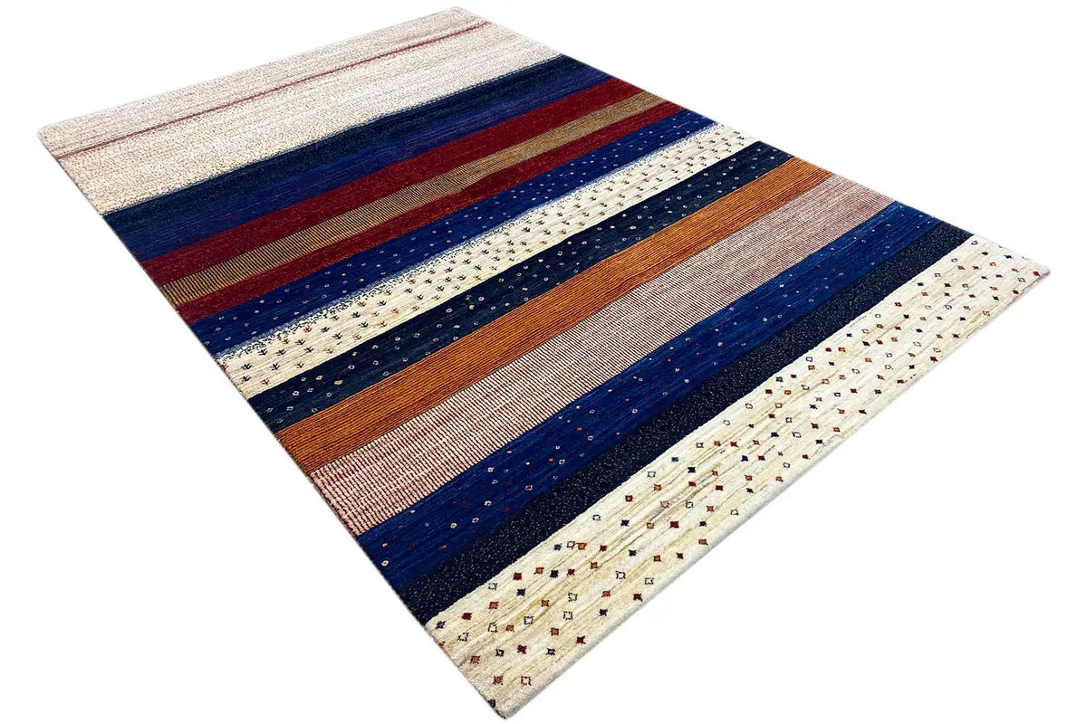 Gabbeh rug with an oblique view: horizontal stripes and a delicate dotted pattern along the edge