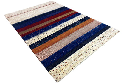 Gabbeh rug with an oblique view: horizontal stripes and a delicate dotted pattern along the edge