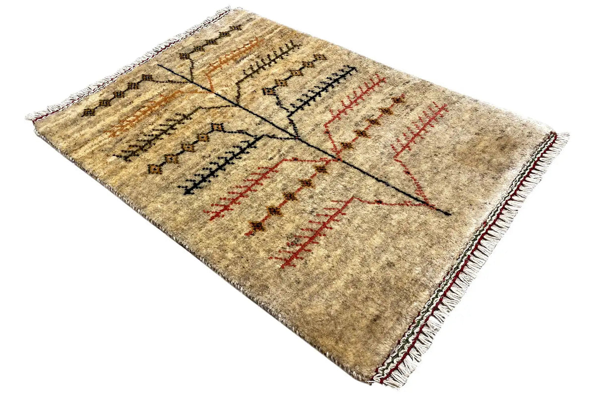 Gabbeh rug: beige pile with red and black decorations, spread out diagonally