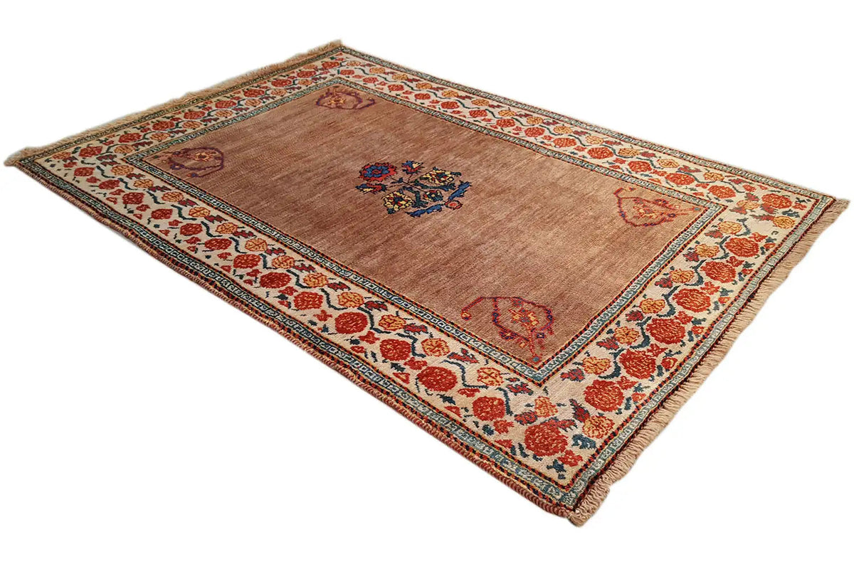 Oriental rug with a brown background, red ornamental border, and central medallion