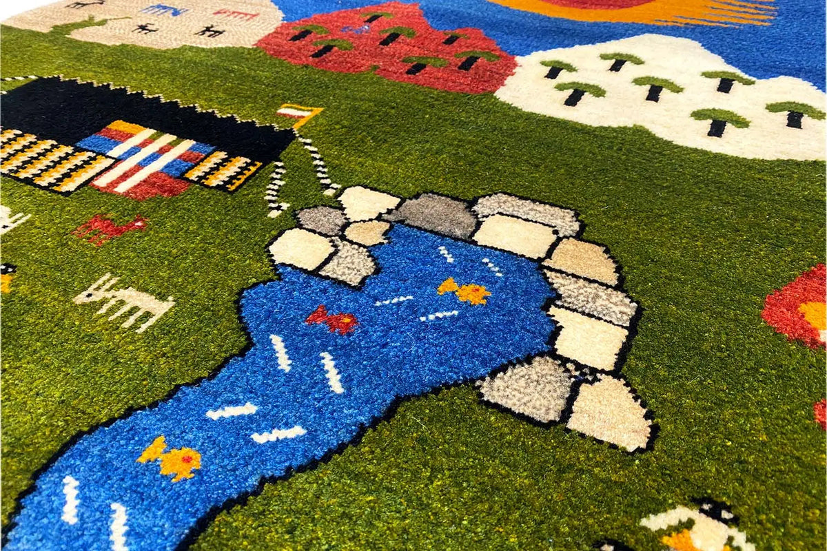 Gabbeh rug (101×101 cm) close-up: blue river with a stone alley and houses