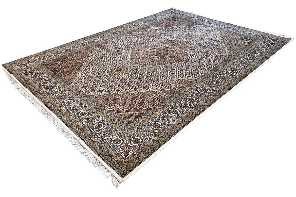 Indo Tabriz rug viewed from above with border and fringes