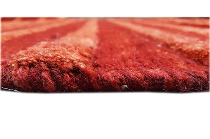 Gabbeh rug 196x147 cm, close-up of the edge: red pile surface with fringes