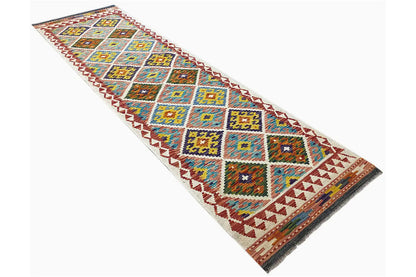 Slanted kilim runner, geometric squares and diamonds in turquoise, yellow, and red