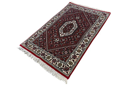 Bidjar rug 94x61 cm, angled: red ornamental pattern, light border, fringes