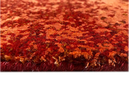 Red high-pile carpet at the edge, abstract color fields in close-up