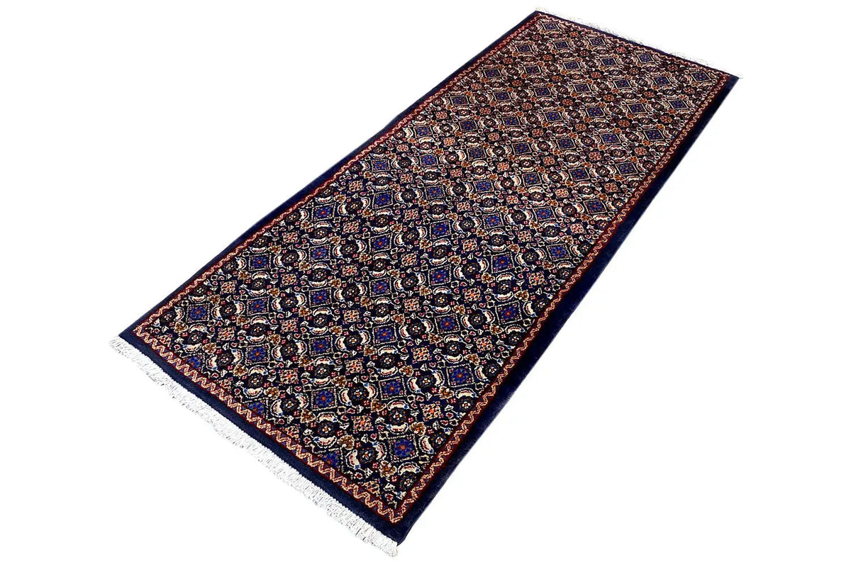 Moud rug diagonal, detailed ornamental pattern in blue, brown, and rust red