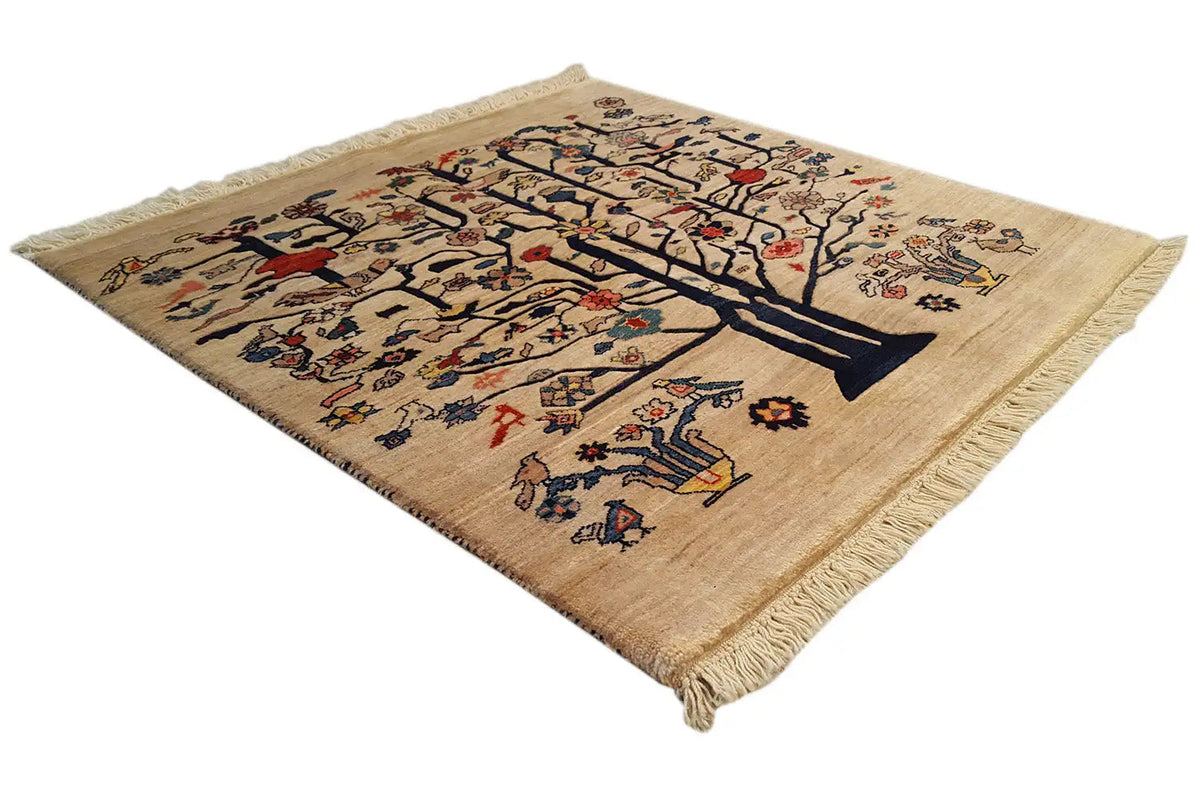 Rug with a beige background, central tree motif, and colorful ornaments