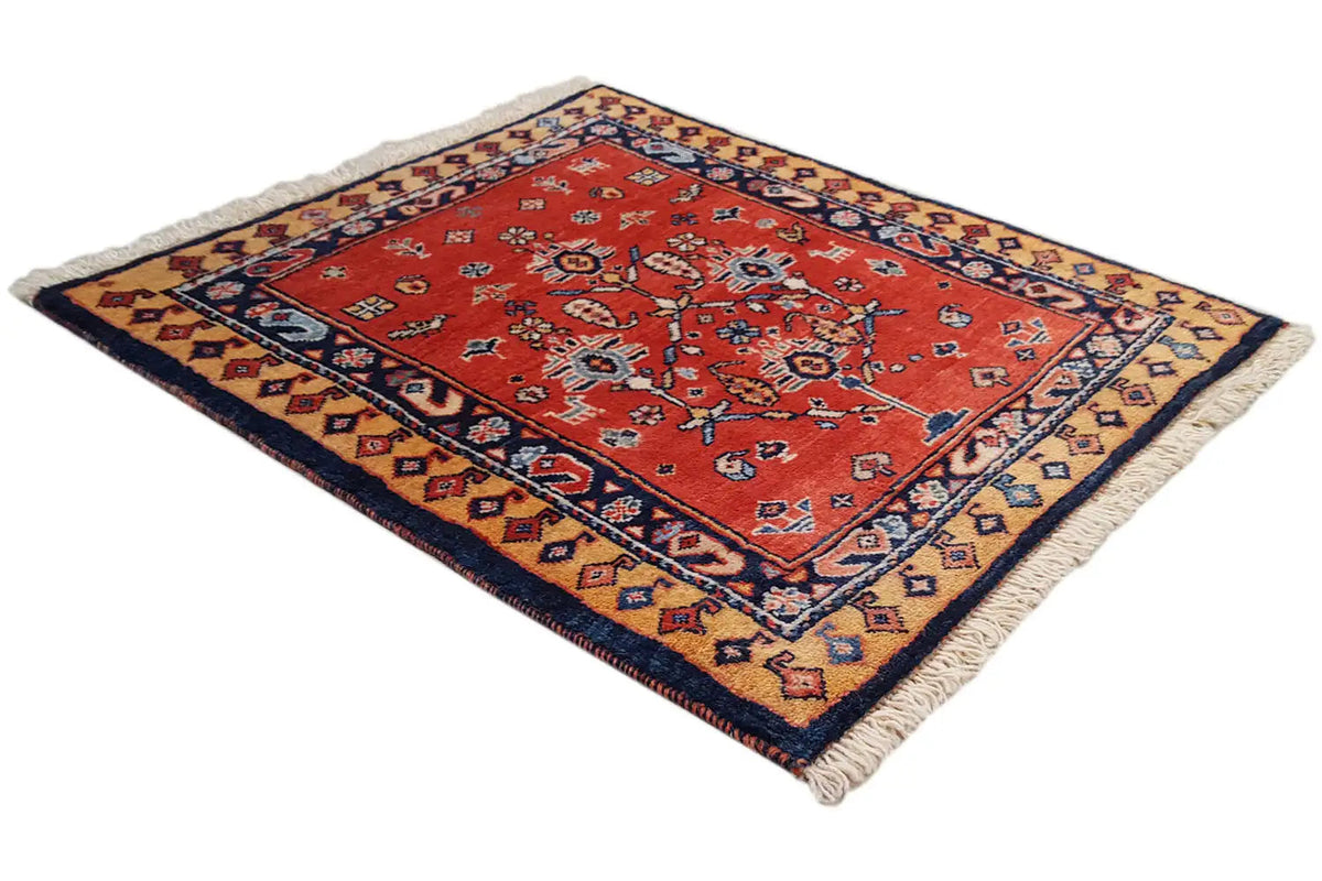 Oriental rug 60x51 cm, red medallion pattern with a blue border and beige fringe
