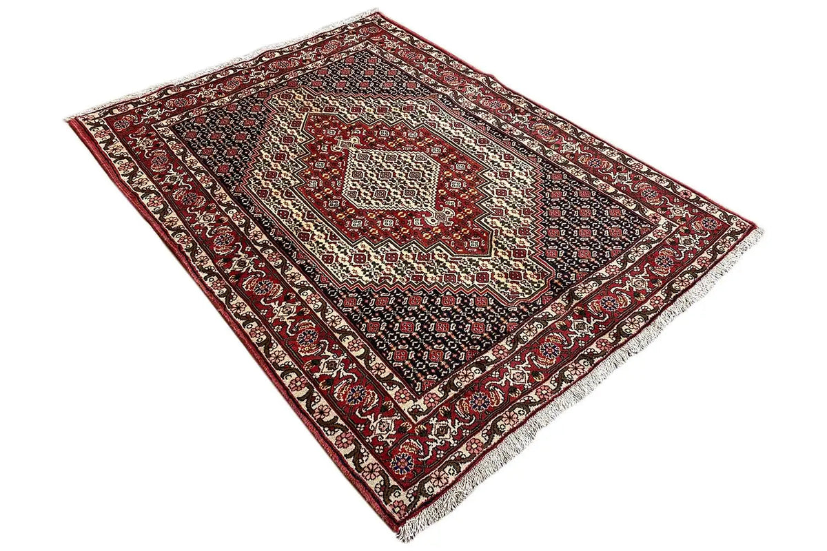 Hamadan rug with a red border, dark blue pattern, and centered medallion