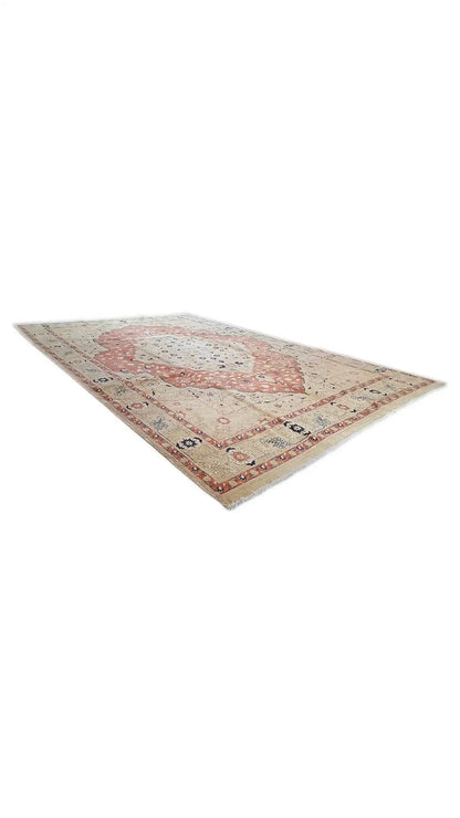 Sultan Abad Exclusive rug, angled view: beige pile with a red pattern and blue details