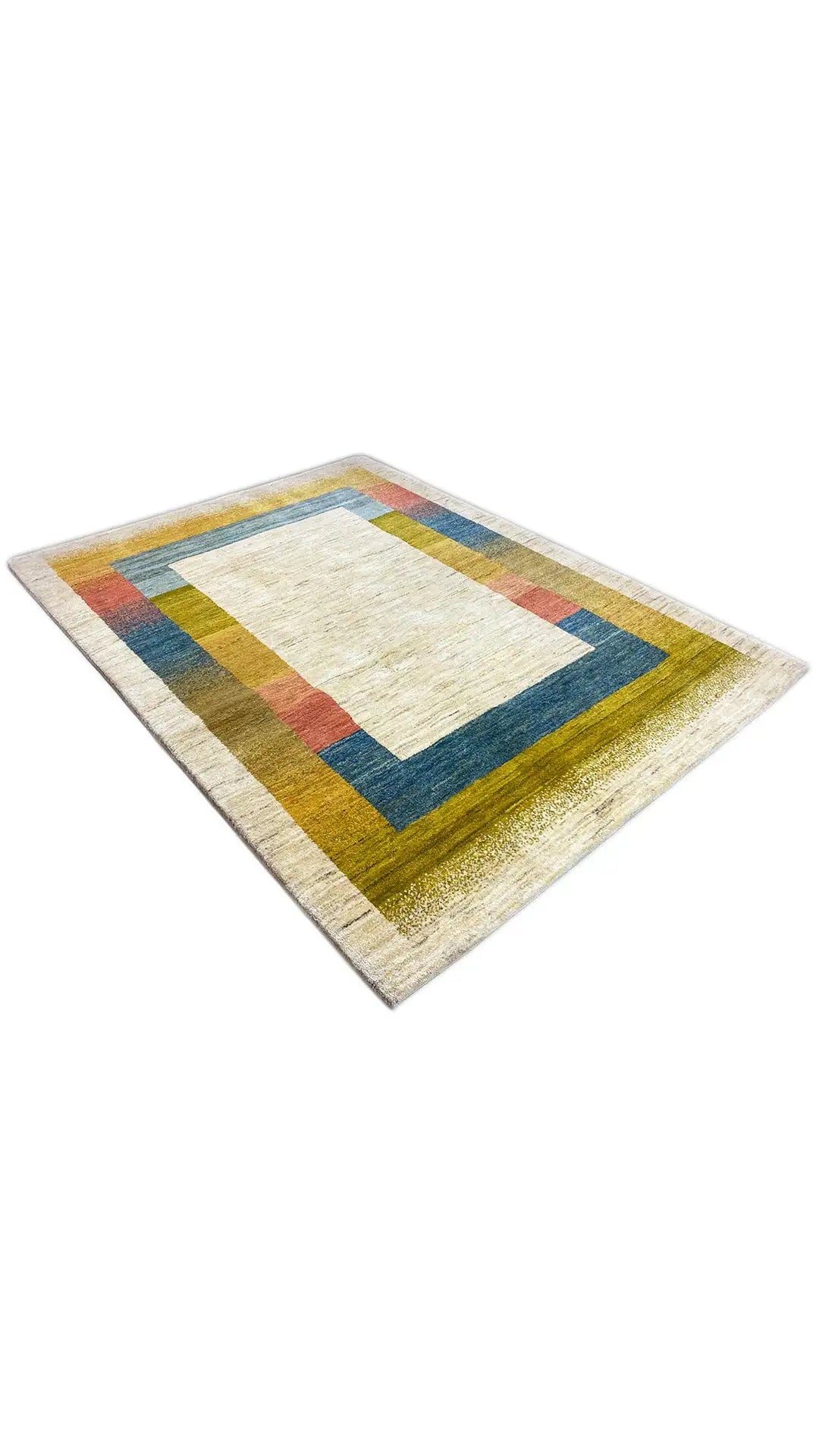 Gabbeh rug viewed from above at an angle: geometric colored border, light beige center.