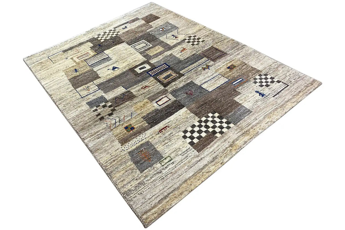 Rug with beige pile, gray-brown rectangles, and black-and-white checkered patterns