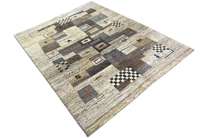 Rug with beige pile, gray-brown rectangles, and black-and-white checkered patterns
