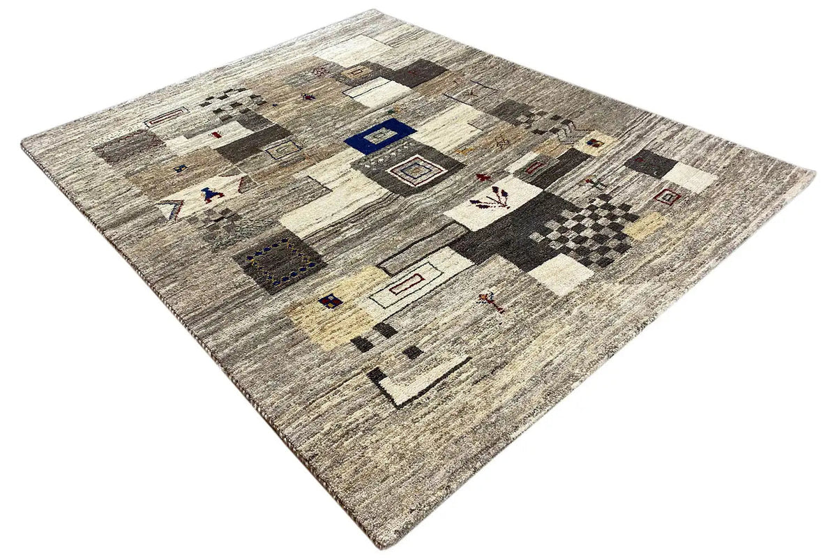 Gabbeh rug 192x152 cm, light beige with a patchwork mosaic of gray, black, and blue