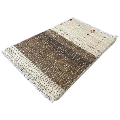 Gabbeh rug 59x41 cm, diagonal view: brown area, light zones, fringes