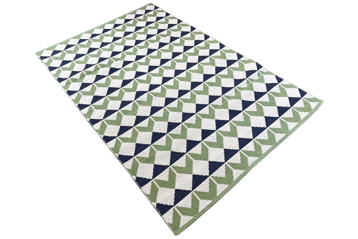 Upright kilim rug with diagonal triangular and diamond patterns in green and blue
