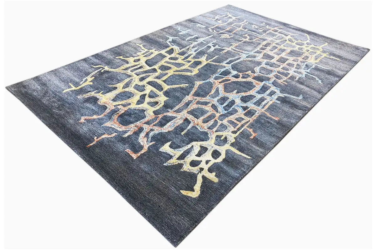 Hand-tufted rug, blue-gray with a yellow-accented animal-skin-like pattern