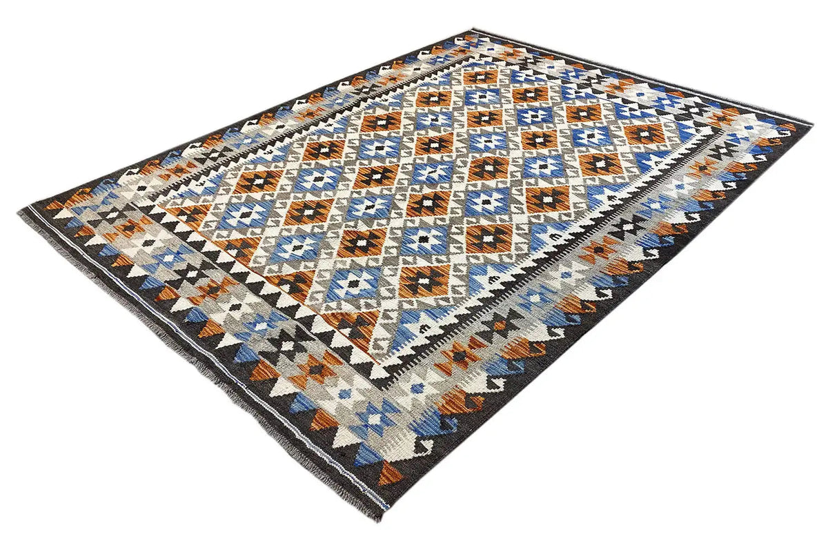 Afghan kilim rug with geometric diamonds, orange-brown details, and a dark border
