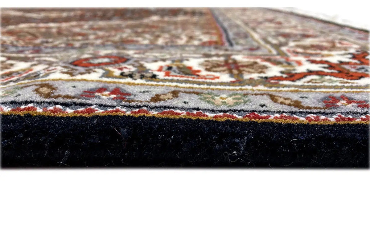 Indo Tabriz rug border with colorful ornaments and fringes, brown