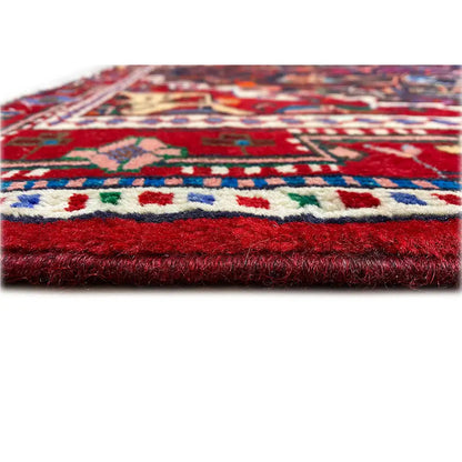 Hamadan rug with a colorful pattern and visible pile or fringe edge.